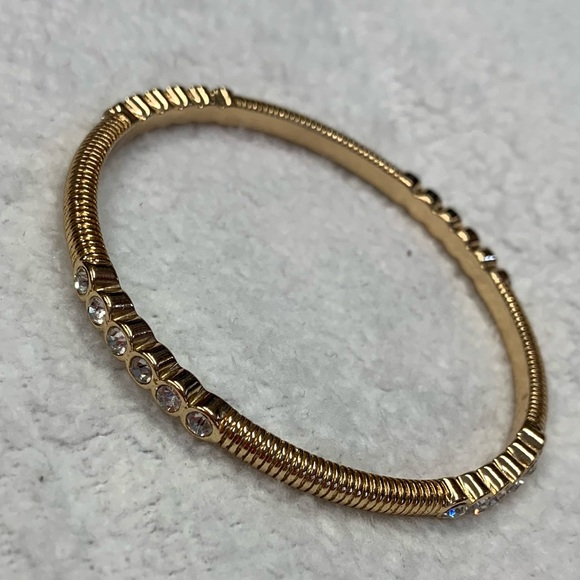 Graziano Gold Tone White Rhinestone Ribbed Bangle Bracelet - Picture 4 of 8